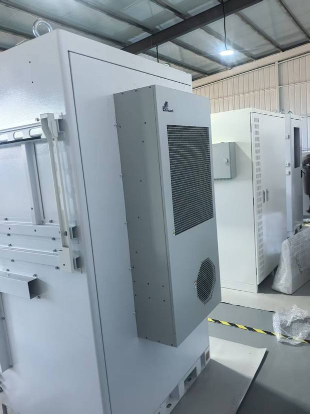 Side view of a cabinet with the cooling unit mounted on the outside wall