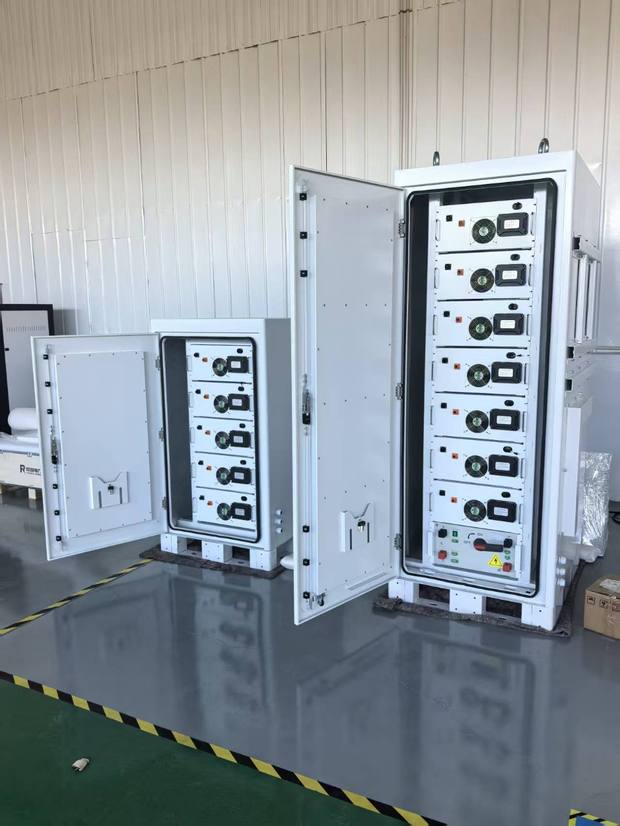 Two open storage cabinets holding five and seven battery modules